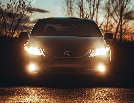 Car headlights through lenses with an anti-reflection coating