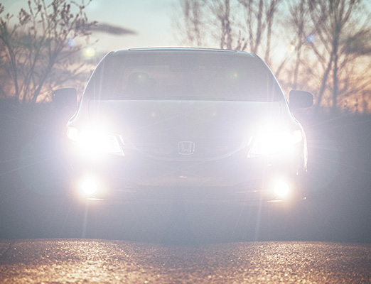 Car headlights through regular lenses